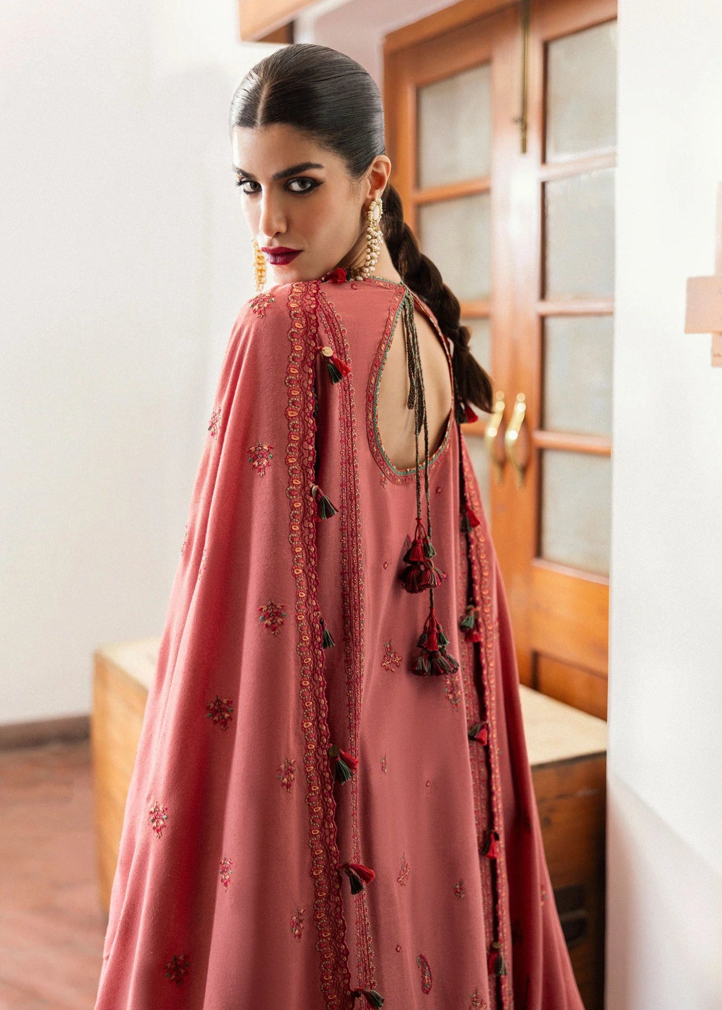 Model wearing Tulle from Hussain Rehar's Karandi AW '24, showcasing luxury Pakistani clothes online in UK.