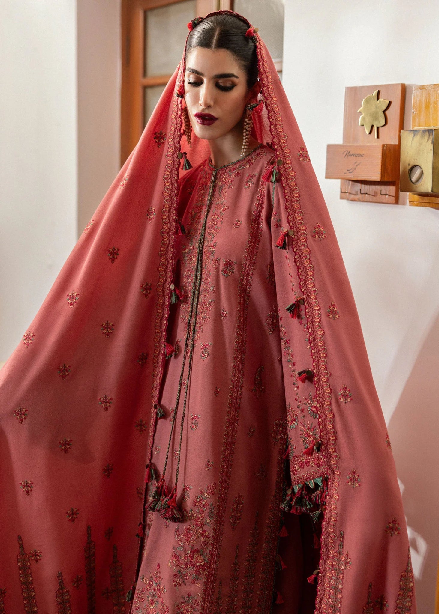 Model wearing Tulle from Hussain Rehar's Karandi AW '24, showcasing luxury Pakistani clothes online in UK.