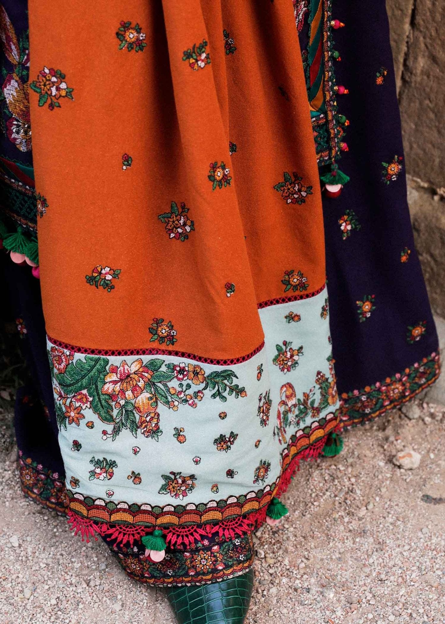 Model wearing Hussain Rehar Karandi Aw'23 Amethyst dress in navy with orange dupatta, showcasing Pakistani clothes online in the UK.