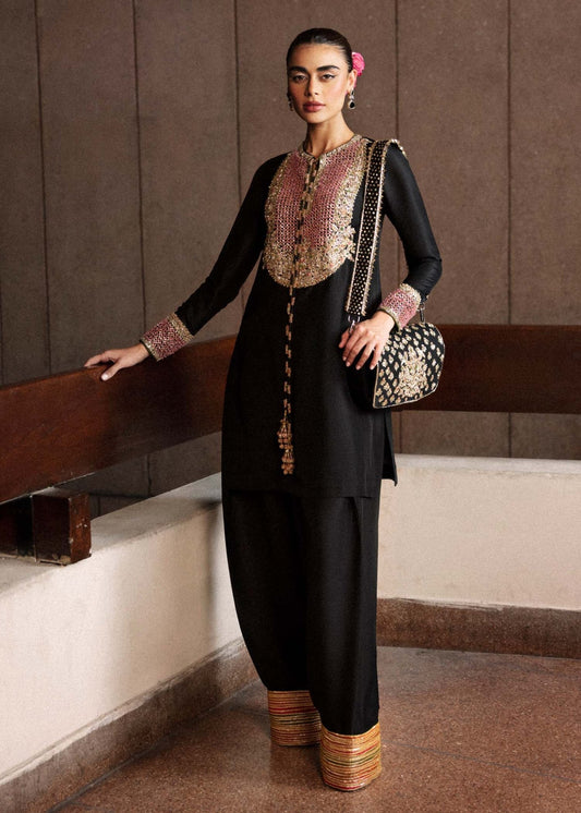 Model wearing Hussain Rehar Char dress in black and gold, ideal for Pakistani designer clothes in UK, readymade wedding clothes, showcasing luxury details for Eid '24.