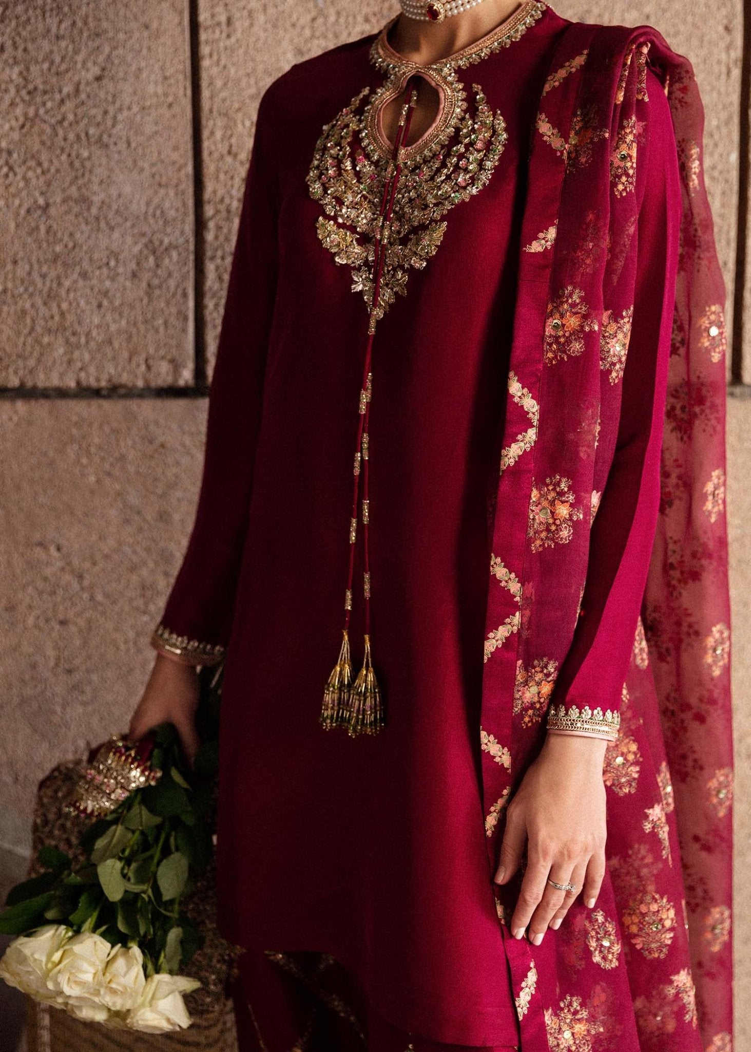 Model wearing an exquisite maroon Merlot dress from Hussain Rehar's Luxury Pret Eid '24 collection. Pakistani clothes online in UK.