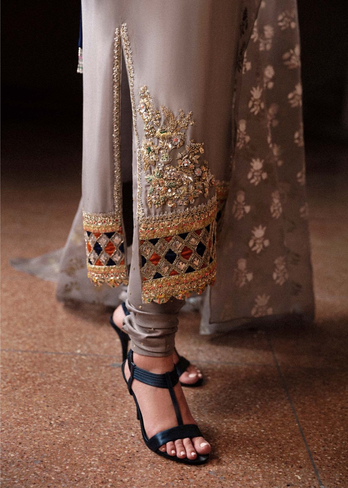 Model wearing a grey Mist dress with intricate embroidery from Hussain Rehar's Luxury Pret Eid '24 collection. Pakistani clothes online in UK.