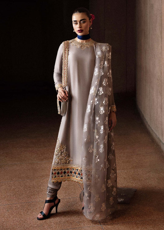 Model wearing Hussain Rehar Mist dress in taupe, ideal for Pakistani designer clothes in UK, readymade wedding clothes, showcasing luxury and intricate details for Eid '24.