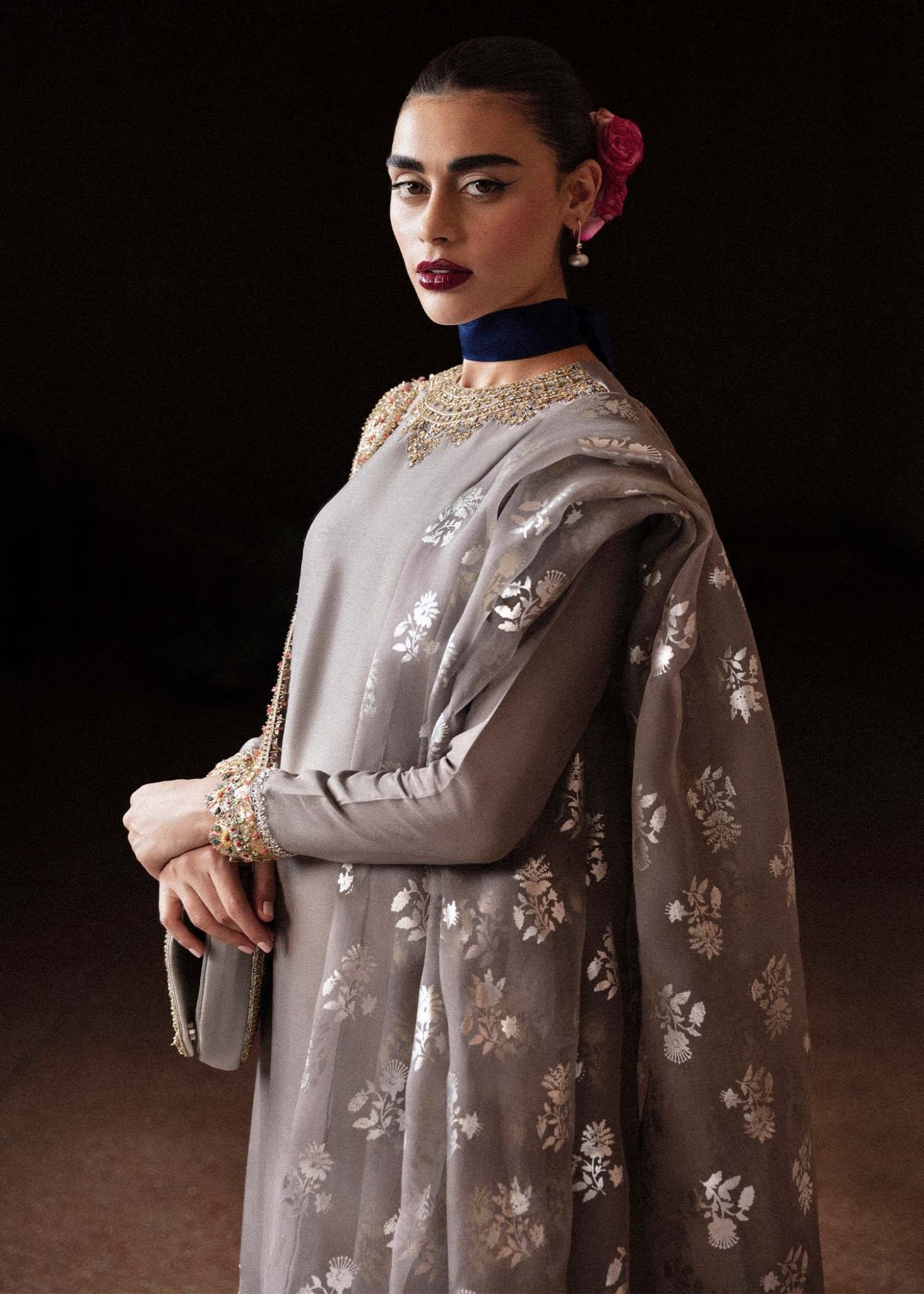 Model wearing a grey Mist dress with intricate embroidery from Hussain Rehar's Luxury Pret Eid '24 collection. Pakistani clothes online in UK.