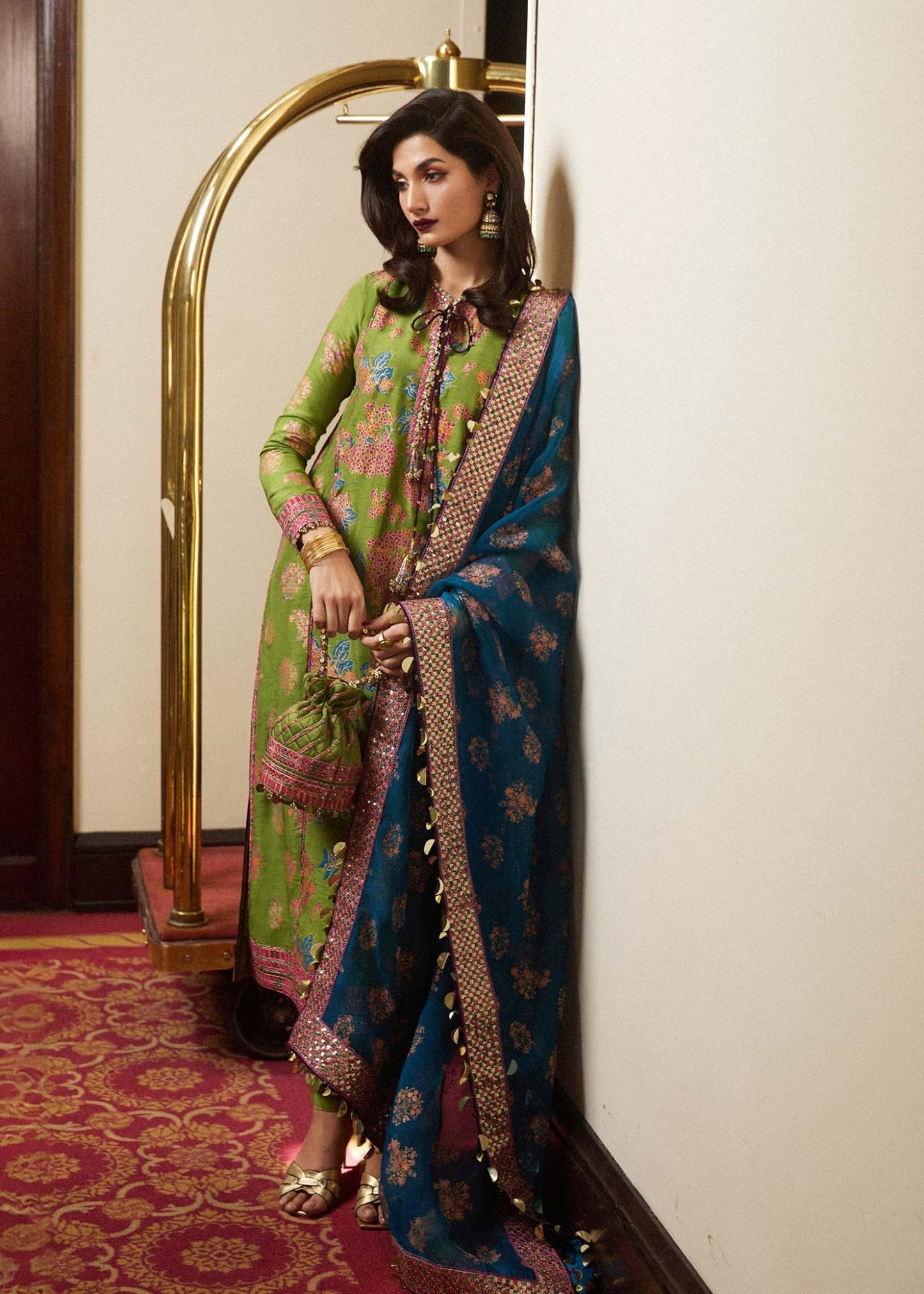 Model wearing Hussain Rehar Anabi dress in elegant green and blue, perfect for Pakistani Eid dresses in the UK.