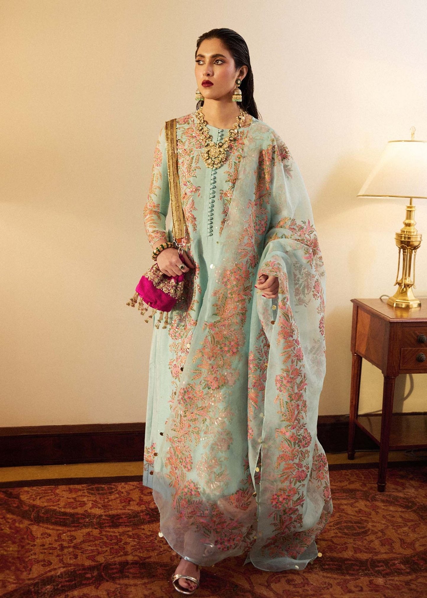 Model wearing Hussain Rehar Salji dress in pastel blue with floral embroidery, ideal for Eid and Pakistani lawn suits in the UK.