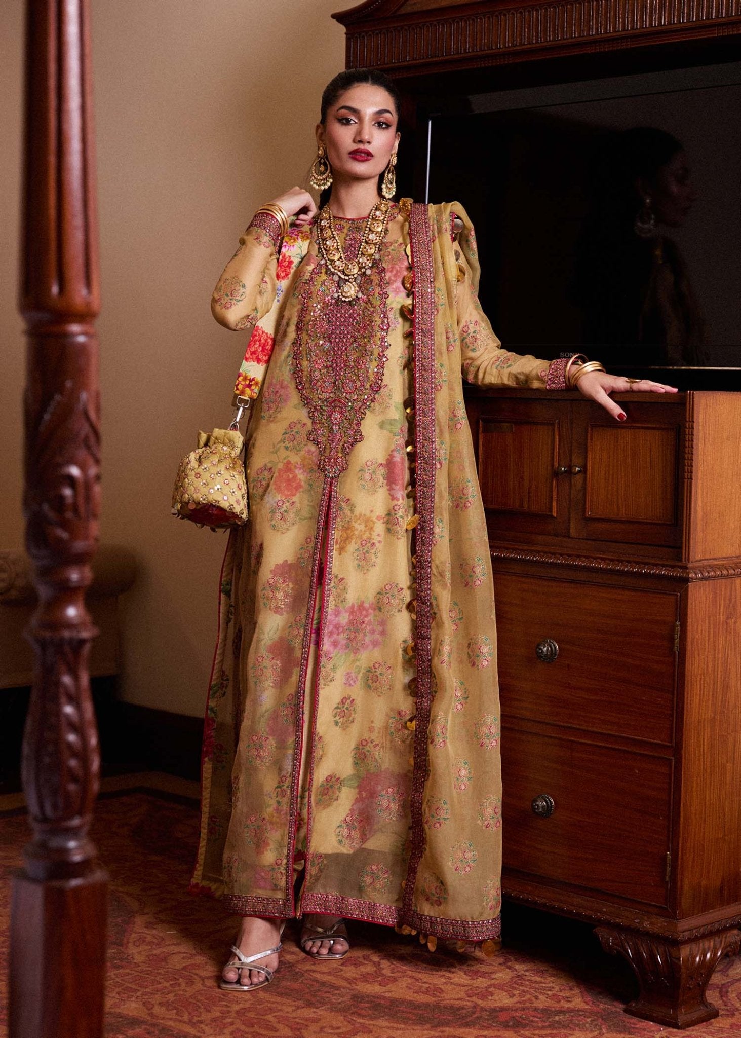 Model wearing Hussain Rehar Seagh dress in floral beige, adorned with rich embroidery, ideal for Pakistani Eid attire in the UK.