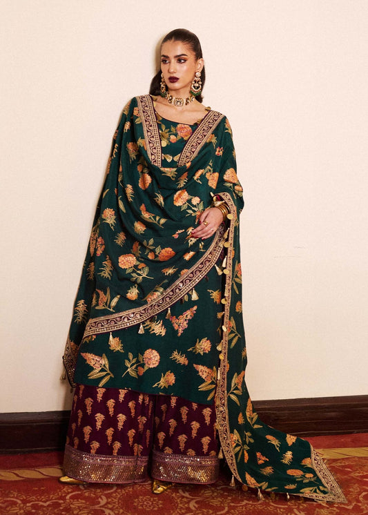 Model wearing Hussain Rehar Taaq dress in chic mehndi green, perfect for Pakistani Eid dresses in the UK.