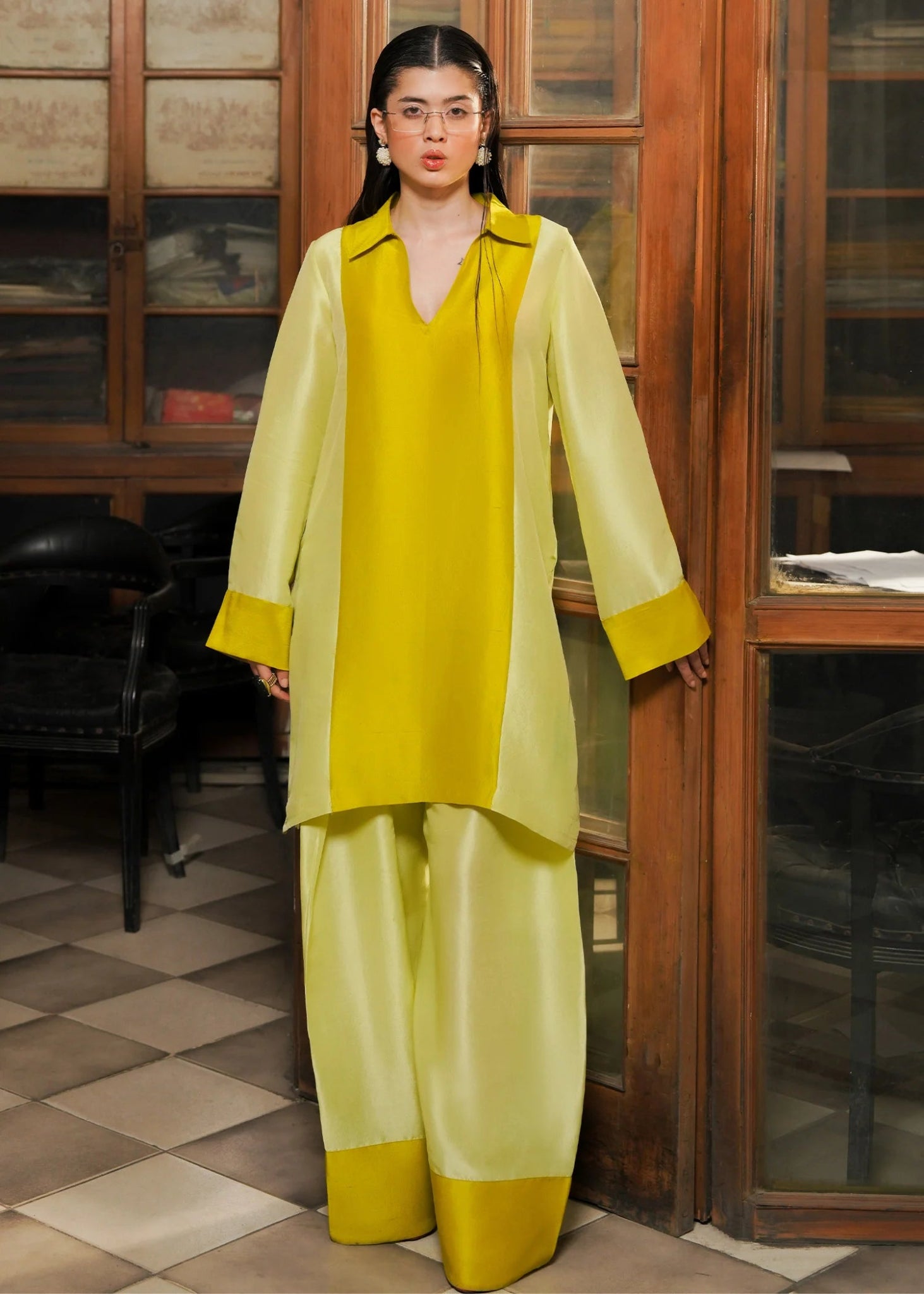 Model wearing Ausmas dress from Hussain Rehar's Pay Day Vol. IV collection. Explore Hussain Rehar and Pakistani clothes online in UK at Signature Labels.