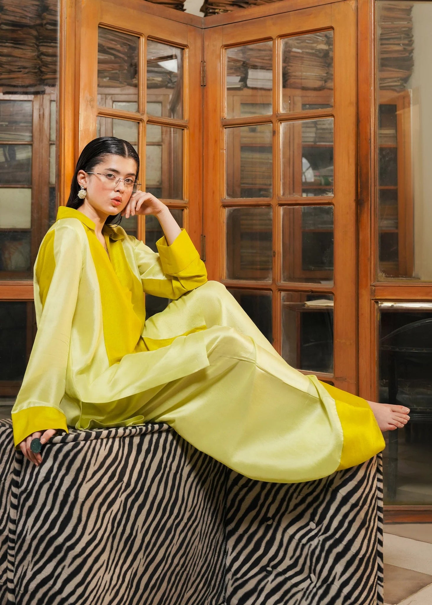 Model wearing Ausmas dress from Hussain Rehar's Pay Day Vol. IV collection. Explore Hussain Rehar and Pakistani clothes online in UK at Signature Labels.