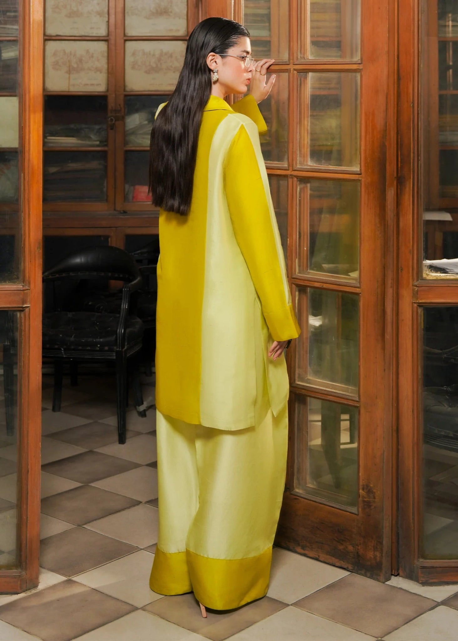Model wearing Ausmas dress from Hussain Rehar's Pay Day Vol. IV collection. Explore Hussain Rehar and Pakistani clothes online in UK at Signature Labels.