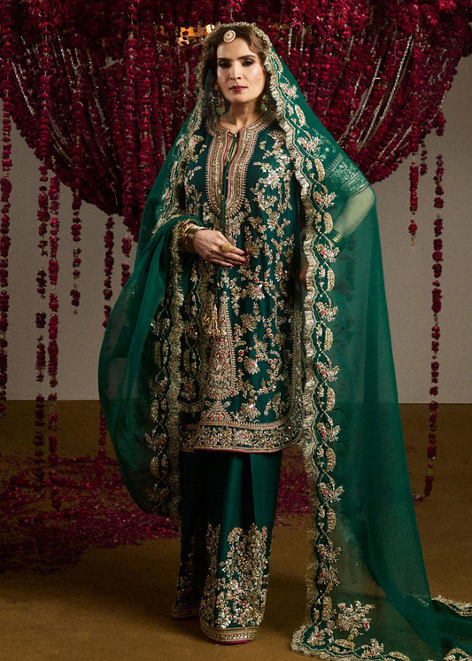 Model wearing Mayle from Hussain Rehar's Rehar Nagar Bridals '24, embodying elegant bridal fashion. Pakistani clothes online in UK.