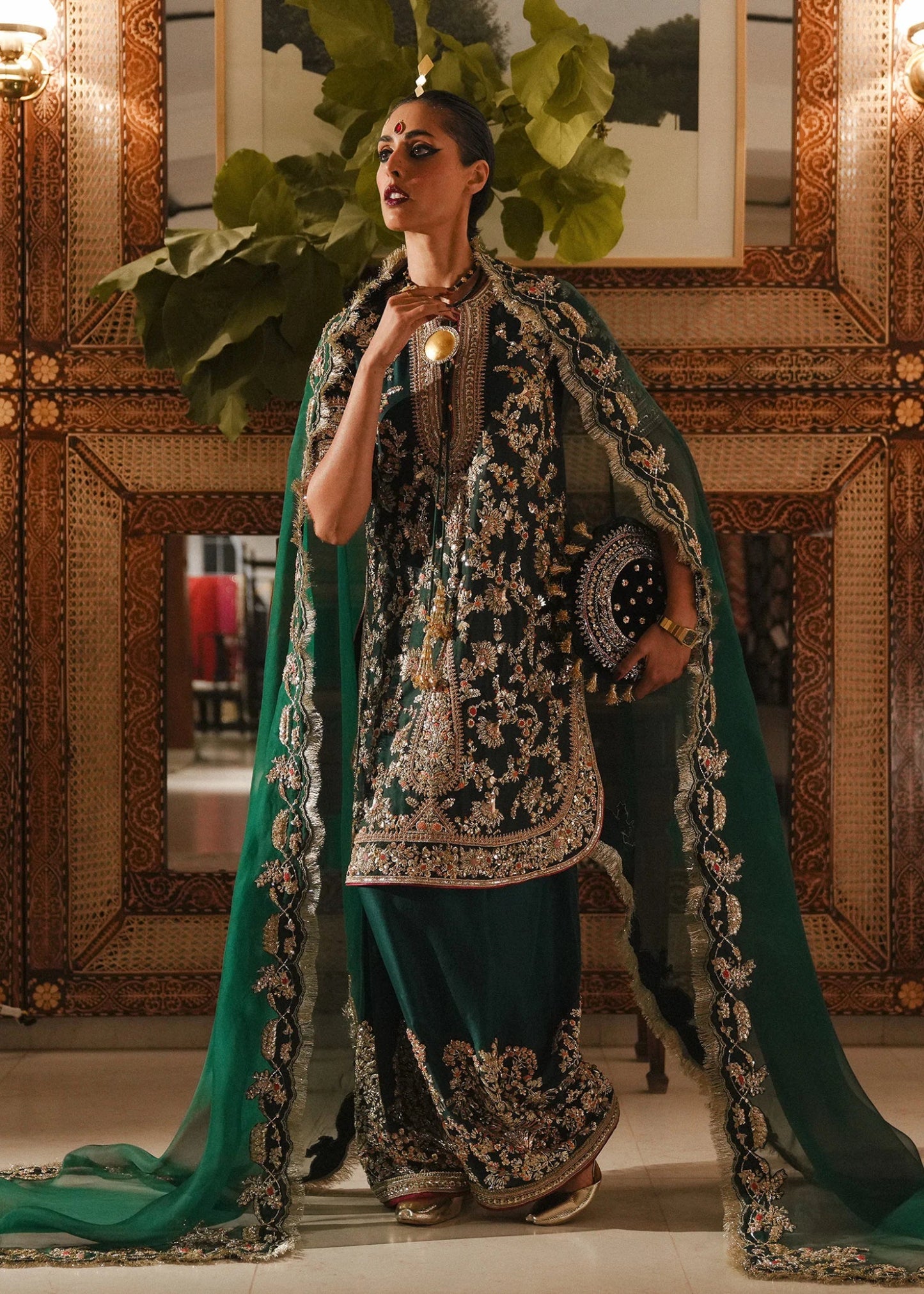 Model wearing Mayle from Hussain Rehar's Rehar Nagar Bridals '24, embodying elegant bridal fashion. Pakistani clothes online in UK.