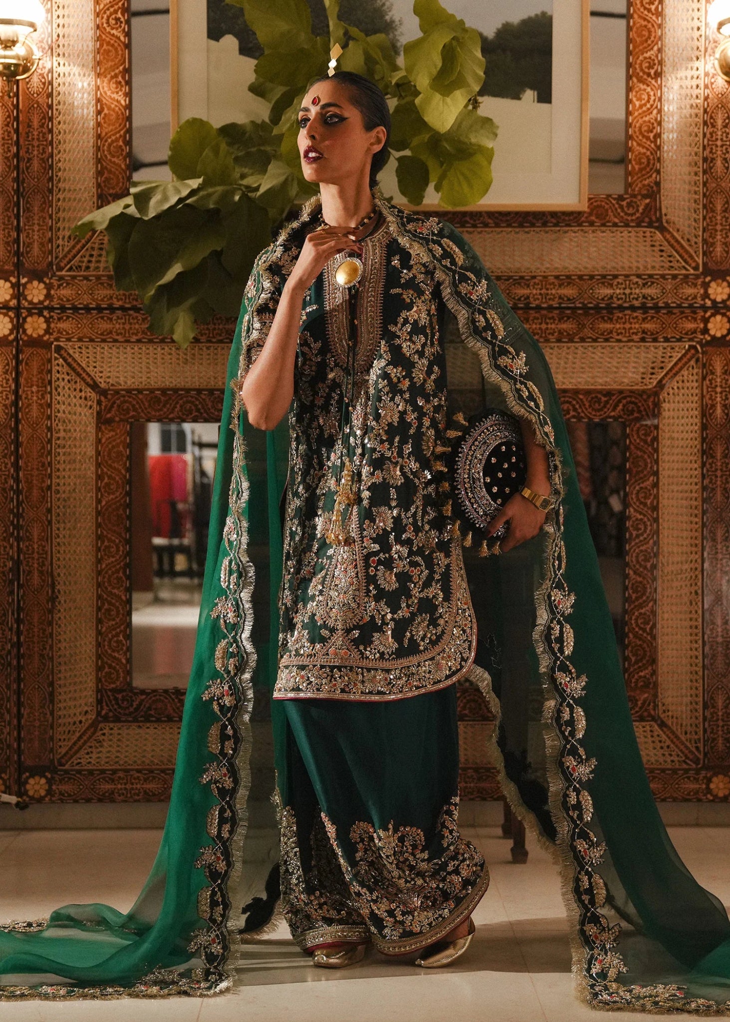 Model wearing Mayle from Hussain Rehar's Rehar Nagar Bridals '24, embodying elegant bridal fashion. Pakistani clothes online in UK.