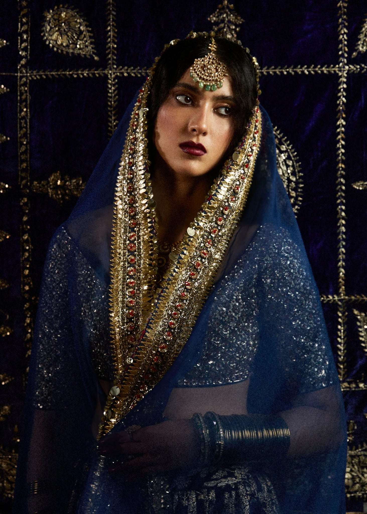 Model wearing Neelam II from Hussain Rehar's Rehar Nagar Bridals '24, an elegant bridal outfit. Pakistani clothes online in UK.