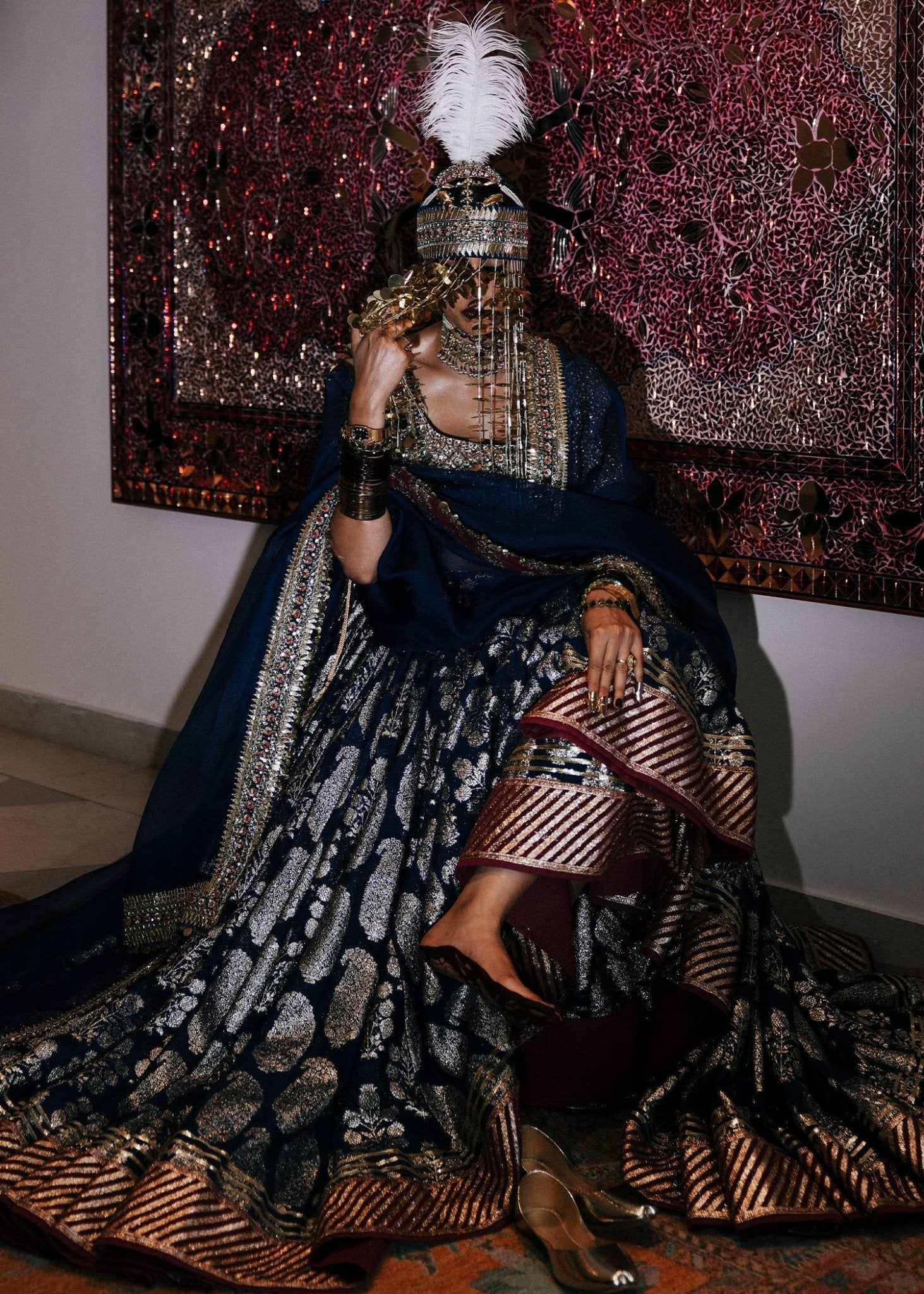 Hussain Rehar's Neelam lehenga from Rehar Nagar Bridals'24 in rich blue with intricate silver embroidery, perfect for luxury bridal wear. Available online in the UK, ideal for formal Pakistani bridal attire.