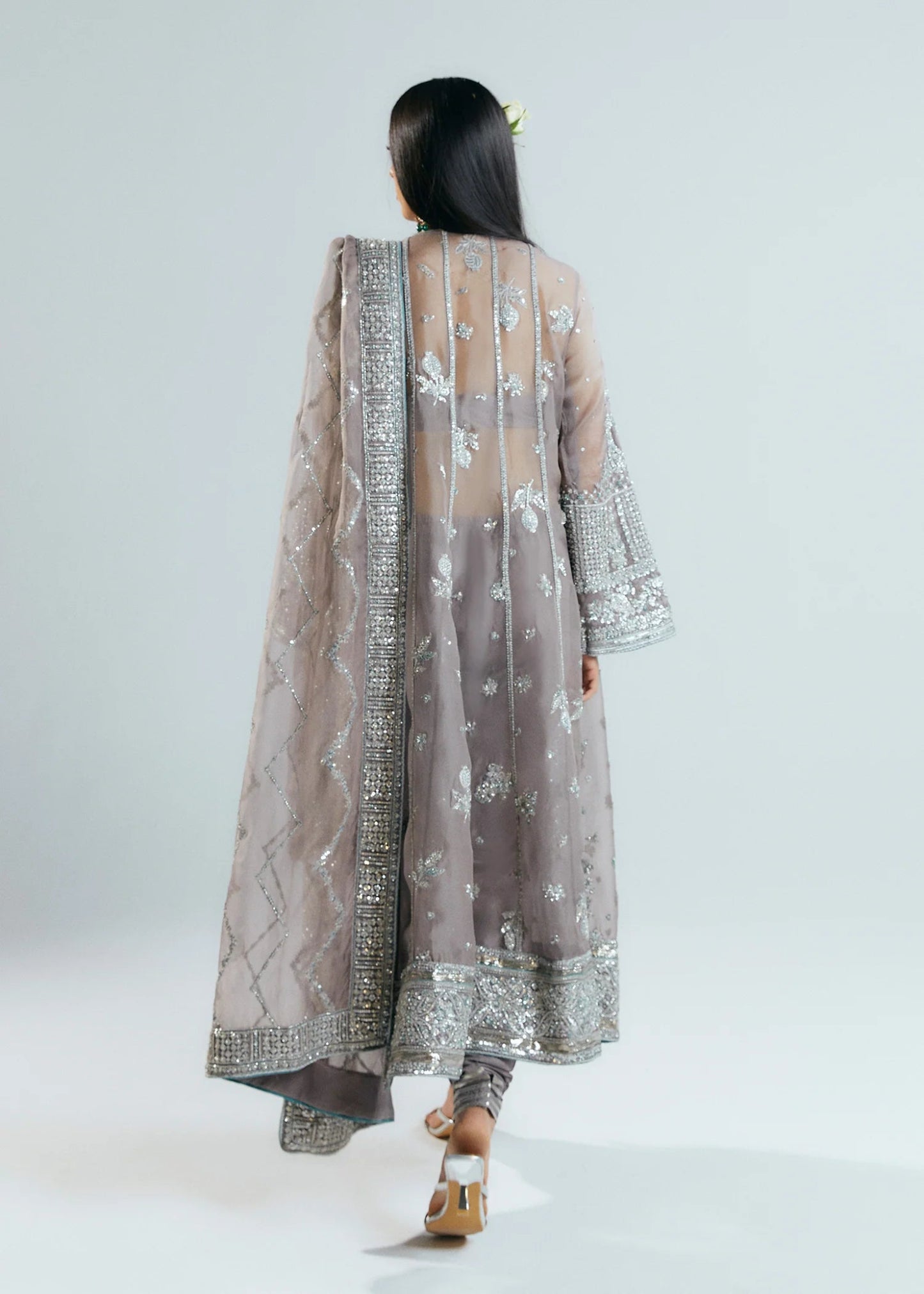 Model wearing Valora dress in a soft lavender hue from Hussain Rehar. Perfect for Pakistani clothes online in the UK and wedding attire.