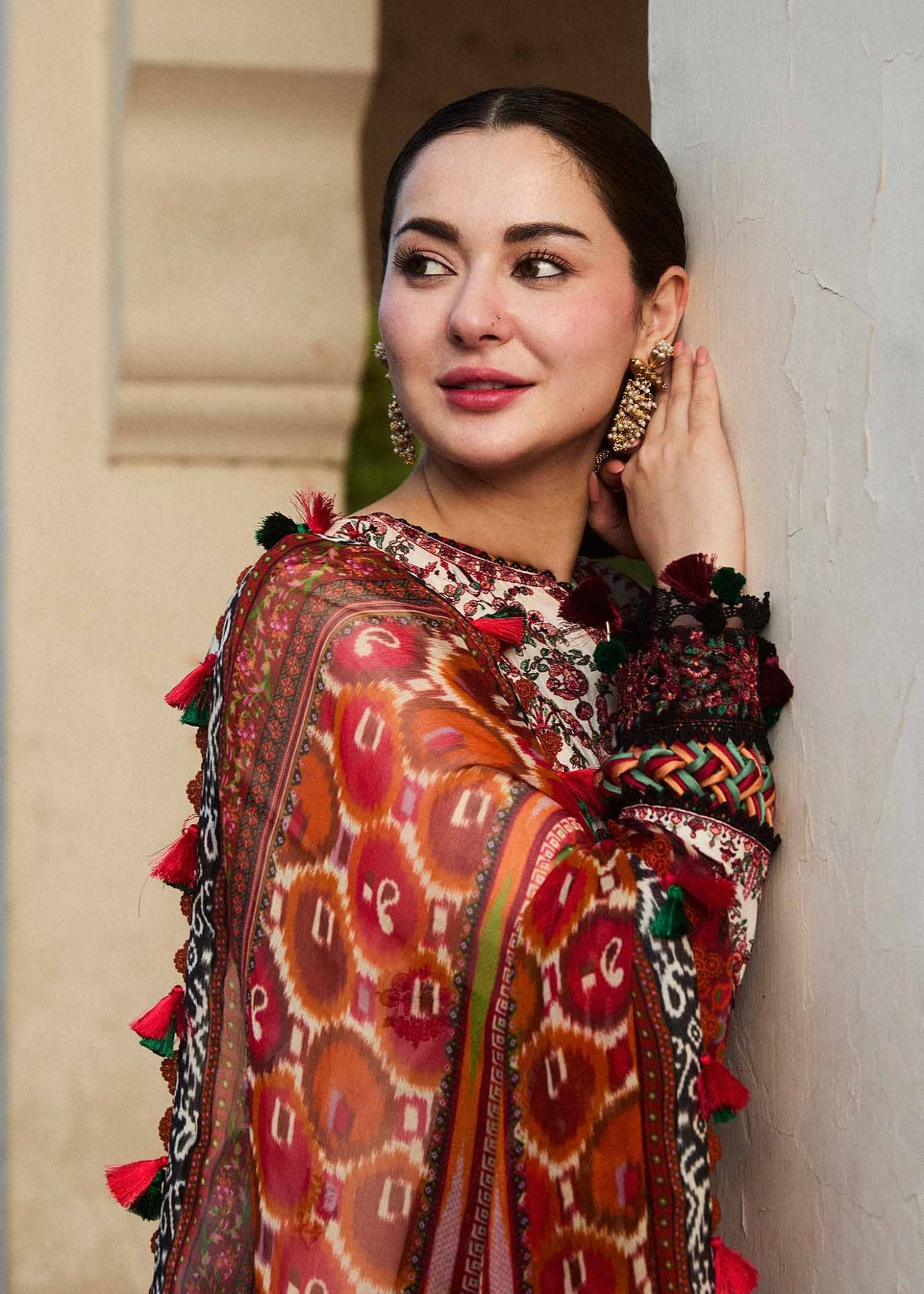 Model wearing a cream Fawn dress from Hussain Rehar's SS Lawn 24 collection. Pakistani clothes online in UK.