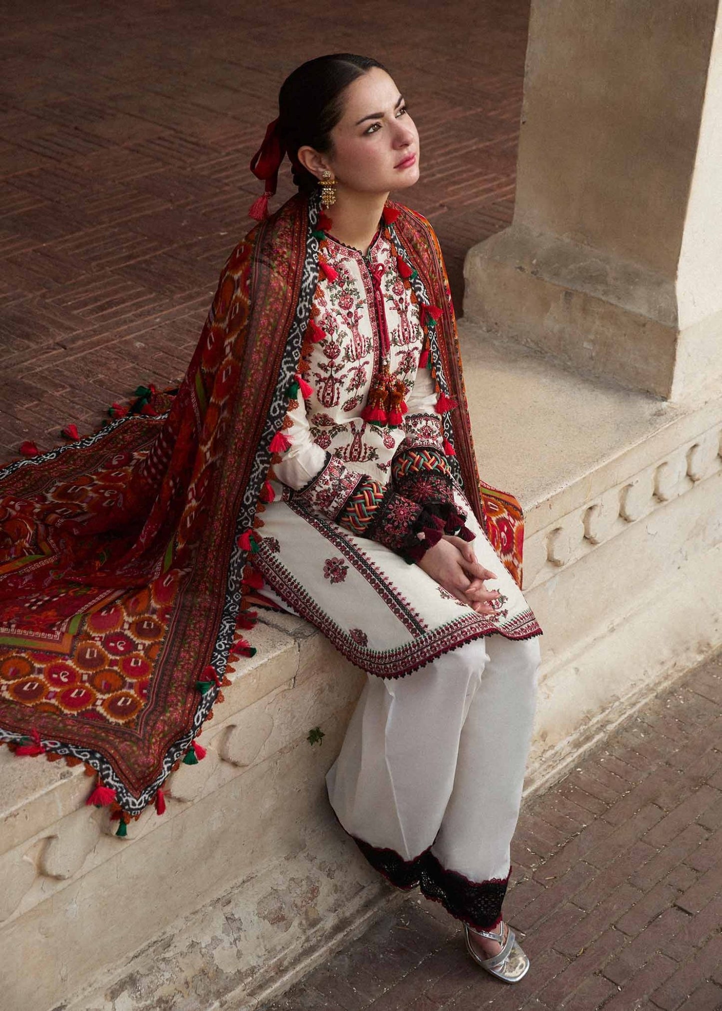 Model wearing a cream Fawn dress from Hussain Rehar's SS Lawn 24 collection. Pakistani clothes online in UK.