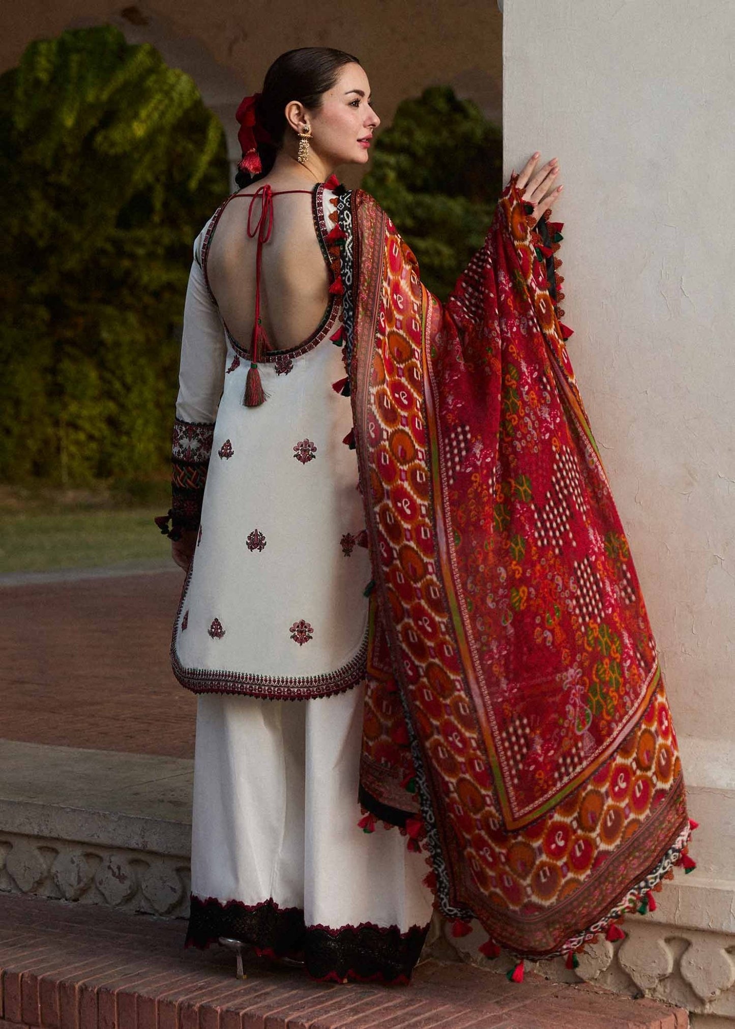 Model wearing a cream Fawn dress from Hussain Rehar's SS Lawn 24 collection. Pakistani clothes online in UK.