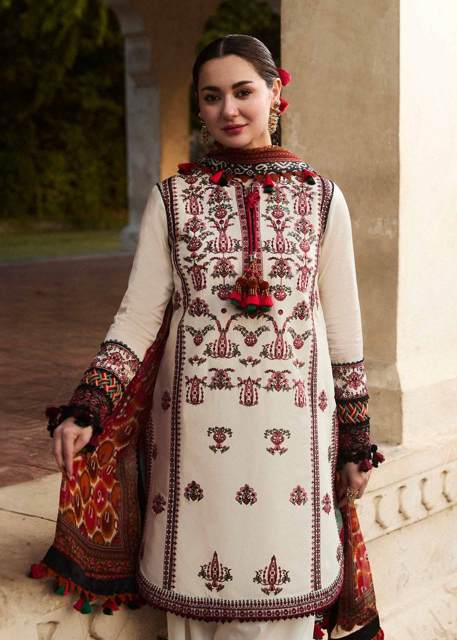 Model wearing a cream Fawn dress from Hussain Rehar's SS Lawn 24 collection. Pakistani clothes online in UK.