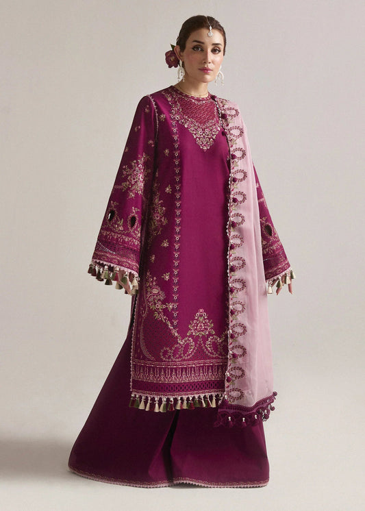 Model wearing a deep pink Sangria dress from Hussain Rehar's SS Lawn Eid Collection '24. Pakistani clothes online in UK.