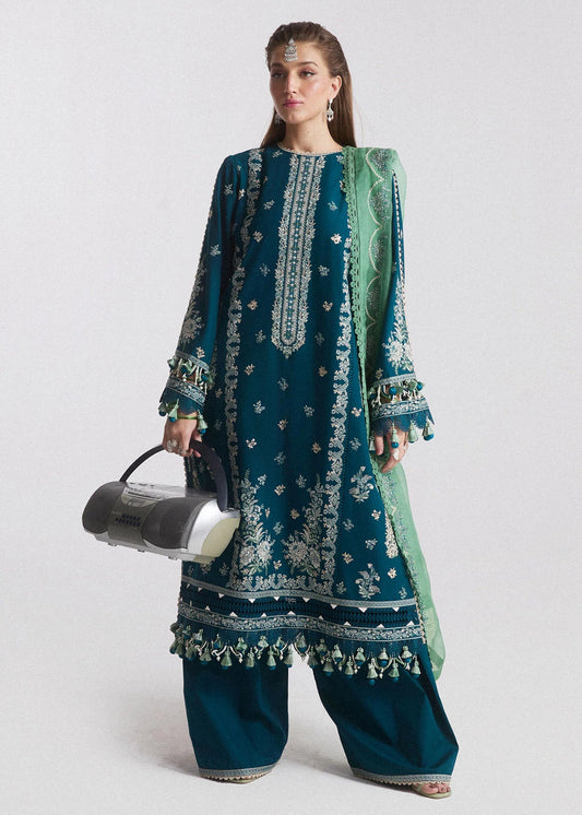 Model wearing a teal Vivace dress from Hussain Rehar's SS Lawn Eid Collection '24. Pakistani clothes online in UK.