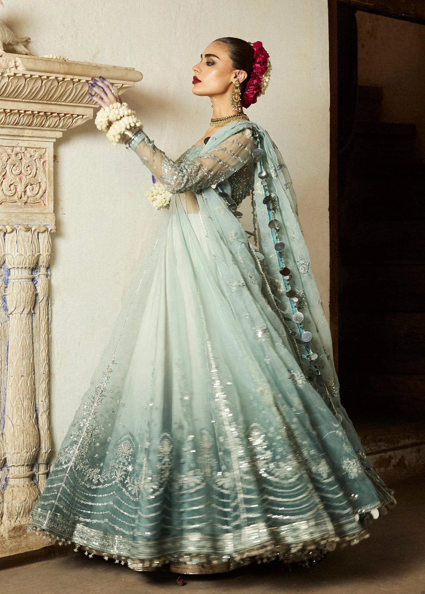 Model wearing a soft blue Maa’iya dress from Hussain Rehar's Wedding Festive Sep '24 Collection, featuring intricate embellishments. Pakistani wedding clothes available online in the UK.