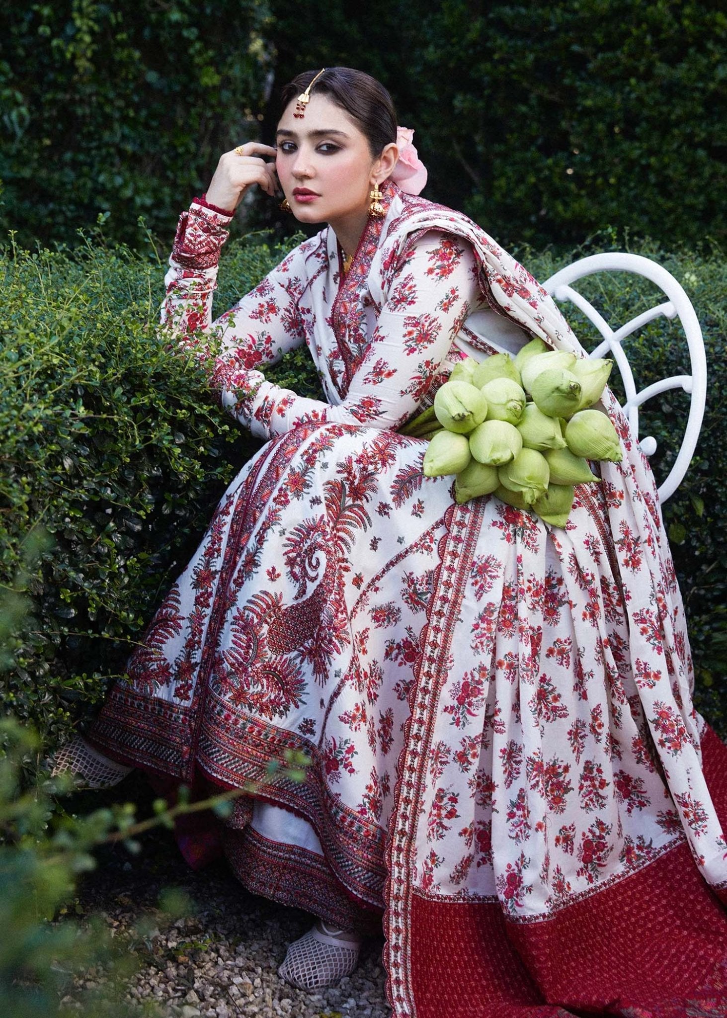 Model wearing white Safaid dress from Hussain Rehar's Zaiba Lawn '24 collection. Pakistani clothes online in UK. Elegant floral embroidery.