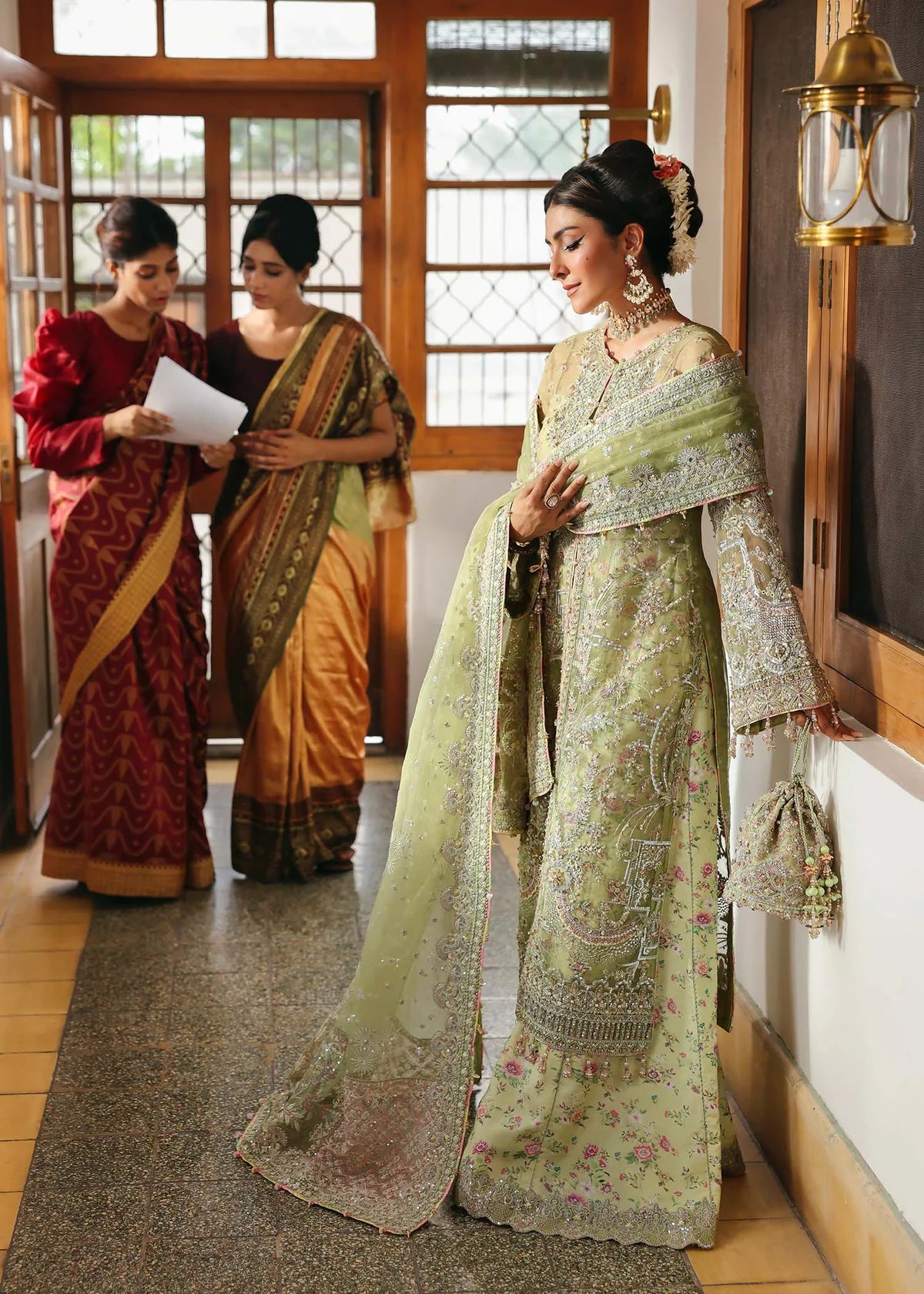 Model wearing Pakiza by Kanwal Malik in pastel green embroidered chiffon – Pakistani luxury pret available online in UK.