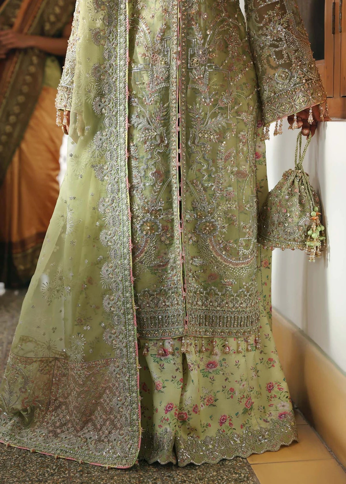 Model wearing Pakiza by Kanwal Malik in pastel green embroidered chiffon – Pakistani luxury pret available online in UK.