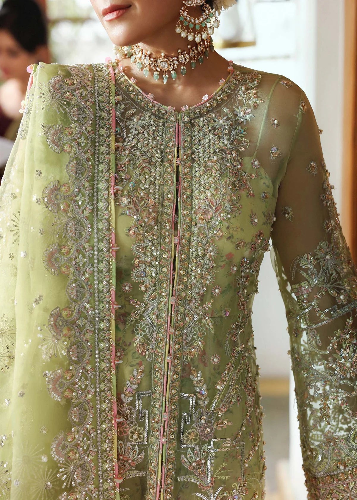 Model wearing Pakiza by Kanwal Malik in pastel green embroidered chiffon – Pakistani luxury pret available online in UK.
