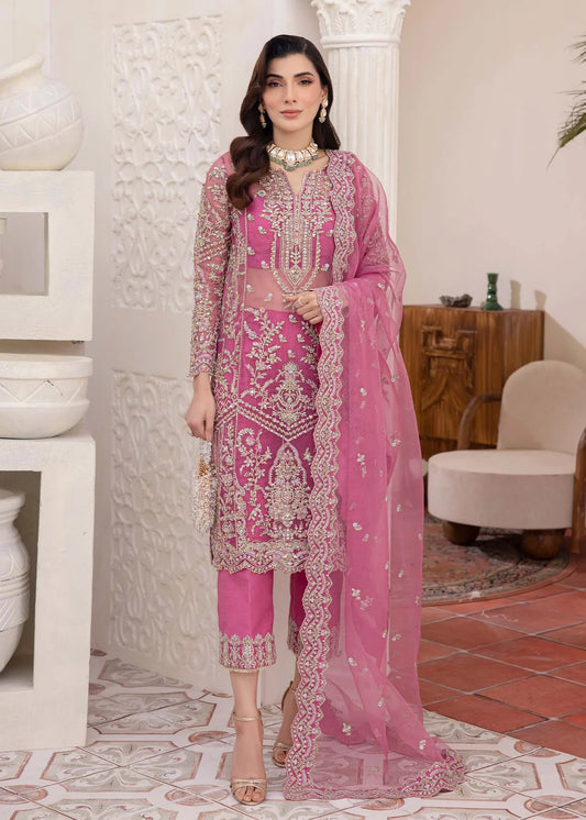Model wearing pink Risha outfit from Kanwal Malik featuring heavy embroidery—Pakistani luxury pret available online in UK.