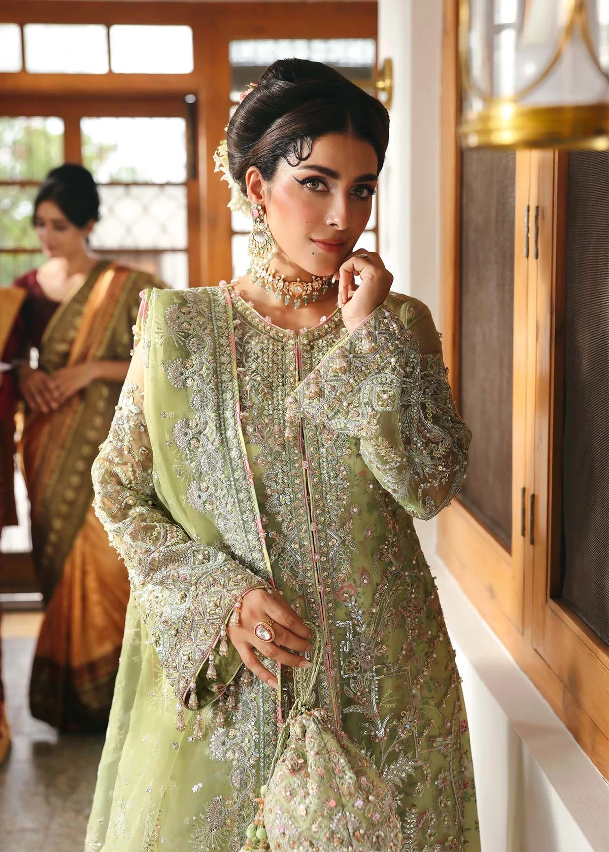Model wearing Pakiza by Kanwal Malik in pastel green embroidered chiffon – Pakistani luxury pret available online in UK.