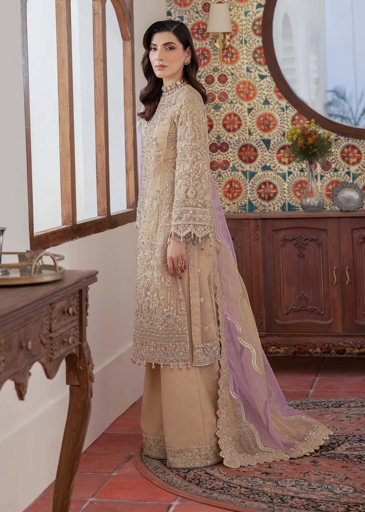 Model wearing beige and lilac Mahin outfit from Kanwal Malik—Pakistani luxury pret perfect for festive wear, shop online in UK now.