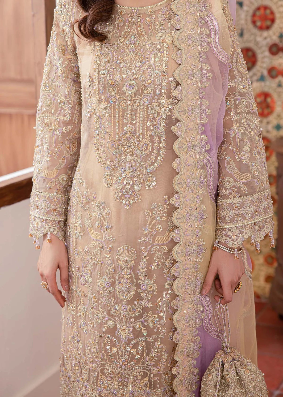 Model wearing beige and lilac Mahin outfit from Kanwal Malik—Pakistani luxury pret perfect for festive wear, shop online in UK now.