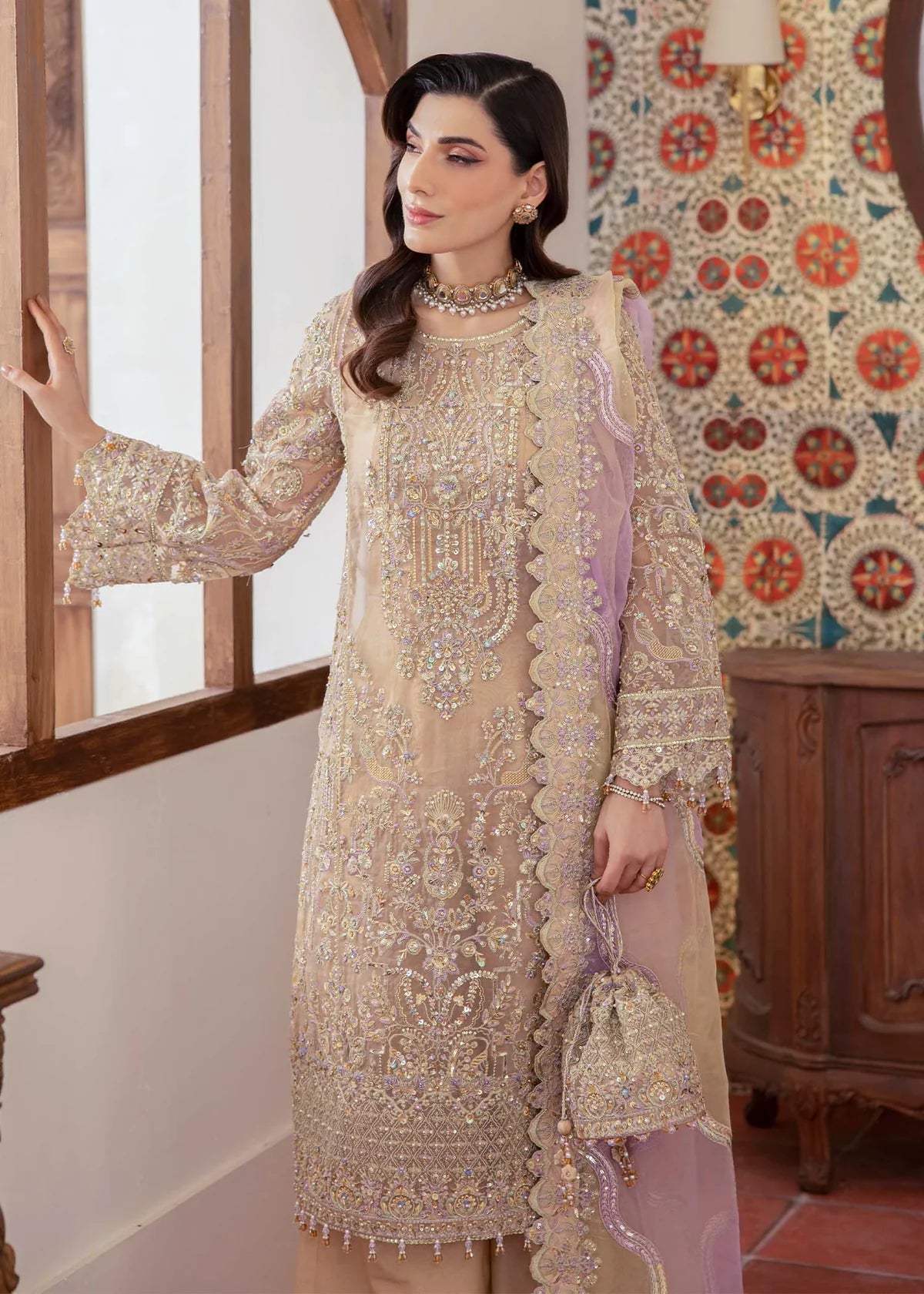 Model wearing beige and lilac Mahin outfit from Kanwal Malik—Pakistani luxury pret perfect for festive wear, shop online in UK now.