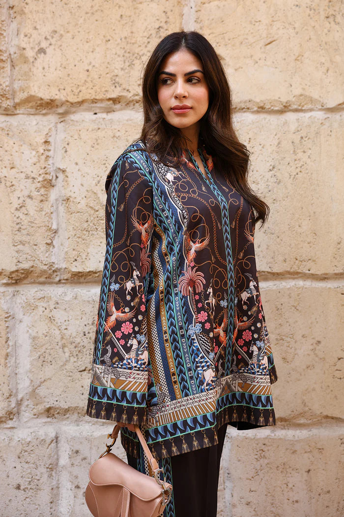 Model wearing black co-ord set with multicolour floral and geometric print from Saira Rizwan, Pakistani Luxury pret, Pakistani clothes online in UK.