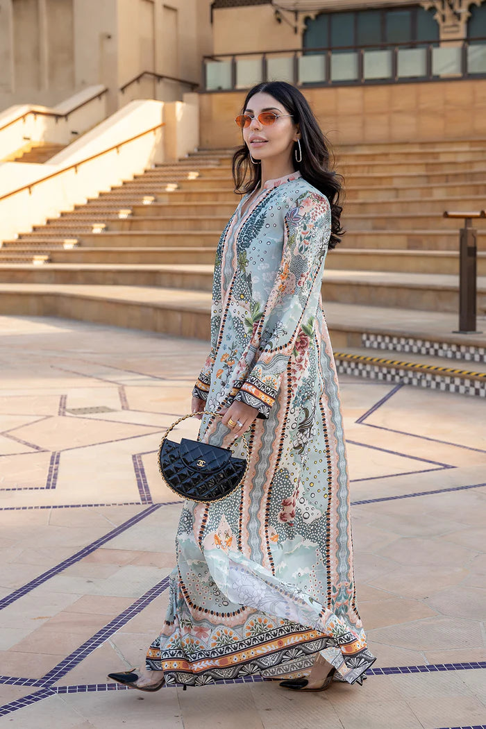 Model wearing multicolour printed long kaftan-style dress with flared sleeves from Saira Rizwan, Pakistani luxury pret, Pakistani clothes online in UK.