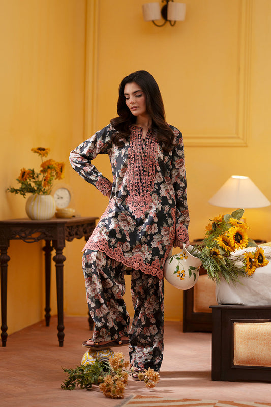 Model wearing charcoal floral embroidered outfit from Saira Rizwan Joolie | CHARCOAL-JBP25-02, Pakistani luxury pret available online in UK.
