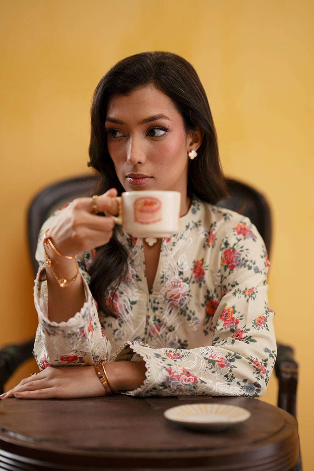 Model wearing beige floral printed outfit from Saira Rizwan Joolie | JOOLIE BEIGE - JBP25-04, Pakistani luxury pret available online in UK.