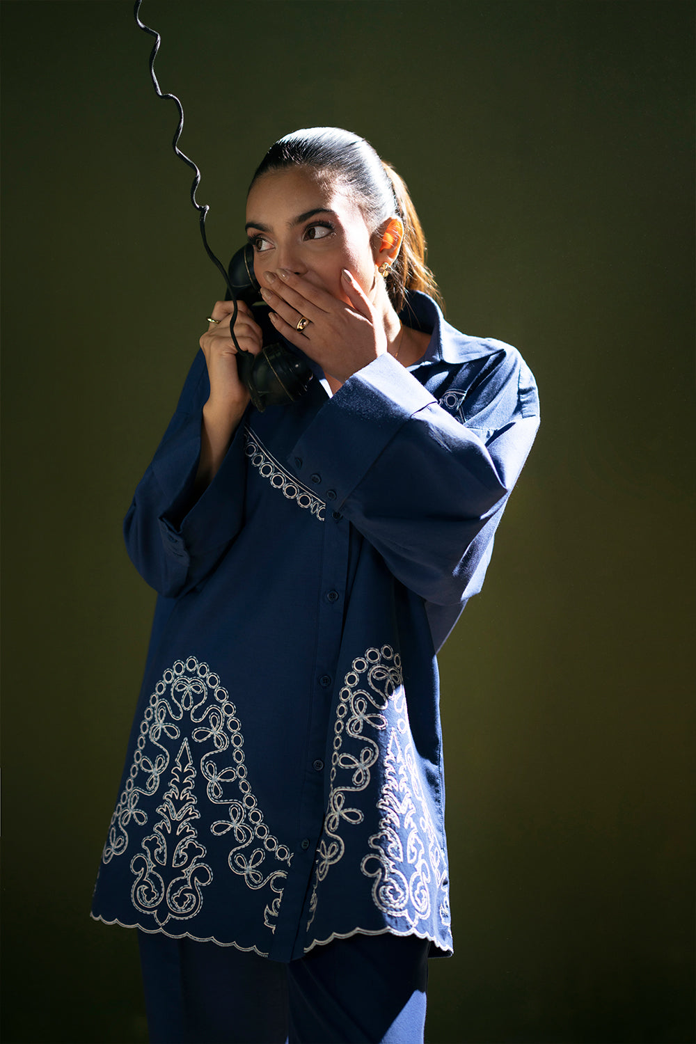Model wearing navy blue embroidered outfit from Saira Rizwan Joolie | BLUE-JBP25-03, Pakistani luxury pret available online in UK.