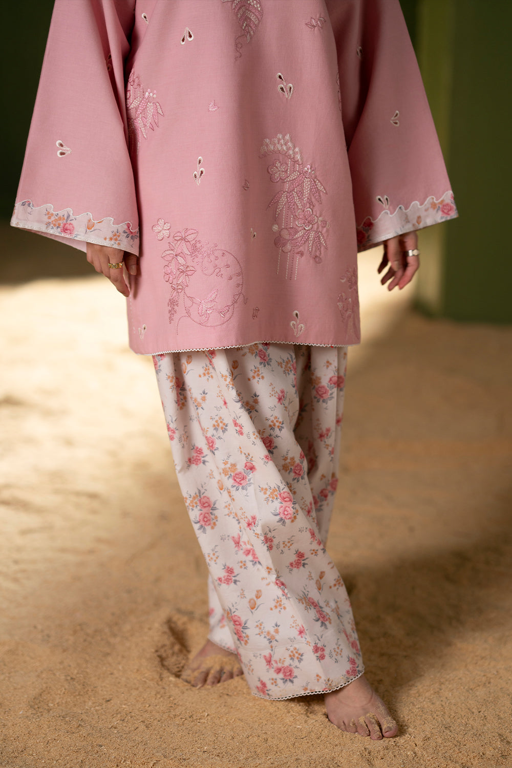 Model wearing pastel pink embroidered outfit from Saira Rizwan Joolie | JOOLIE PINK - JBP25-08, Pakistani luxury pret available online in UK.
