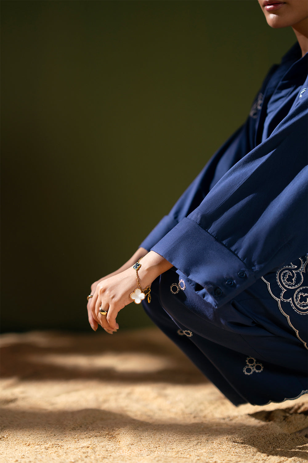 Model wearing navy blue embroidered outfit from Saira Rizwan Joolie | BLUE-JBP25-03, Pakistani luxury pret available online in UK.