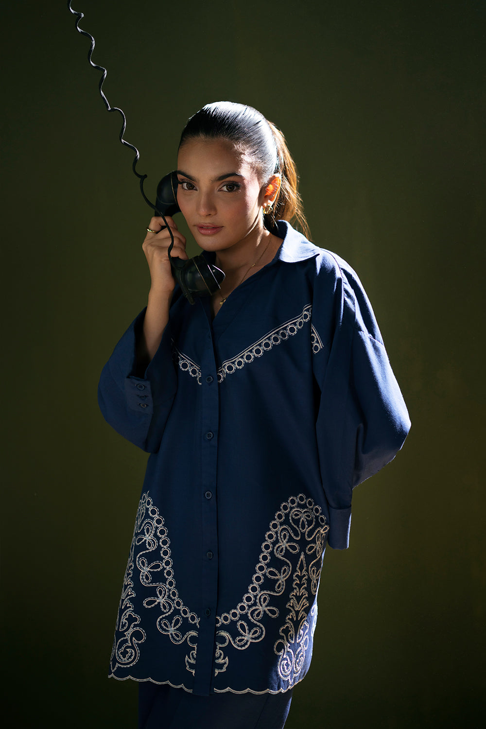 Model wearing navy blue embroidered outfit from Saira Rizwan Joolie | BLUE-JBP25-03, Pakistani luxury pret available online in UK.