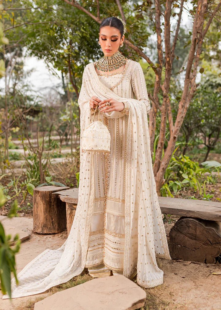 Model displaying Kanwal Malik Afreen Luxury Pret '23 Aynoor dress, symbolizing Pakistani wedding attire online in the UK.