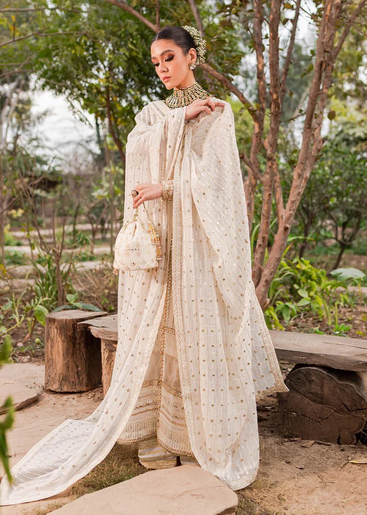 Model displaying Kanwal Malik Afreen Luxury Pret '23 Aynoor dress, symbolizing Pakistani wedding attire online in the UK.