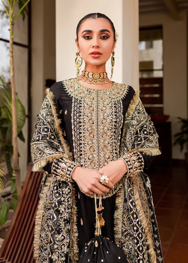 Model showcasing Kanwal Malik Afreen Luxury Pret '23 Chiragh dress, epitomizing Pakistani wedding attire online in the UK.