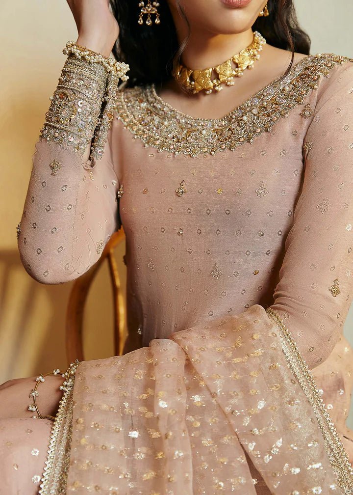 Model wearing blush pink Hala dress from Kanwal Malik, Afsheen Luxury Pret 2024 collection. Pakistani clothes online in UK, wedding clothes.