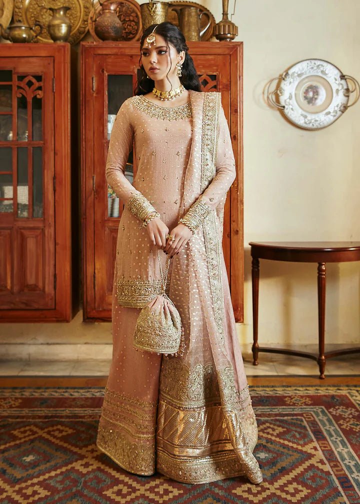 Model wearing blush pink Hala dress from Kanwal Malik, Afsheen Luxury Pret 2024 collection. Pakistani clothes online in UK, wedding clothes.